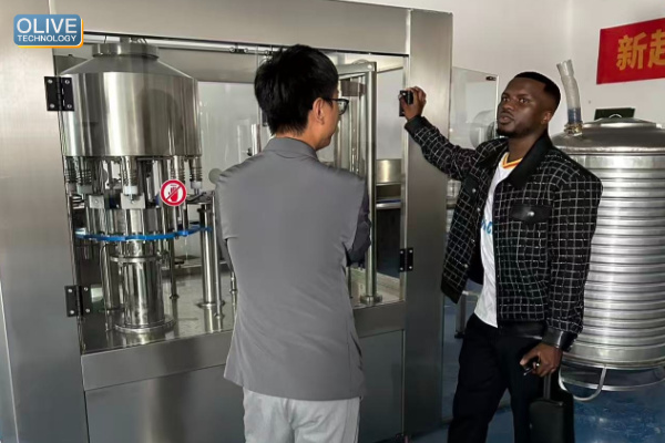 African Client Conducts On-Site Inspection of Oil Presses and Bottling Equipment. Partnership Sealed on the Spot 